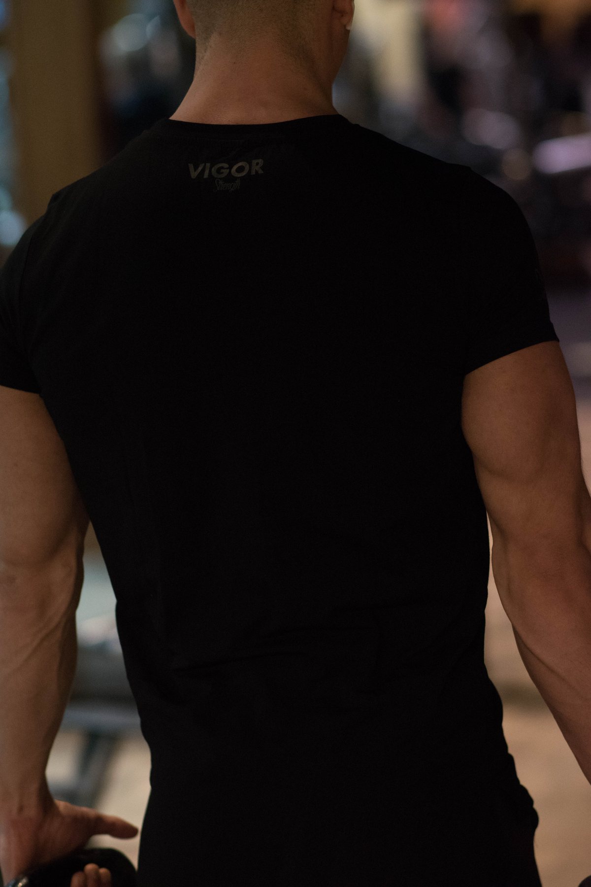 Back-neck lockup on the Signature Tee